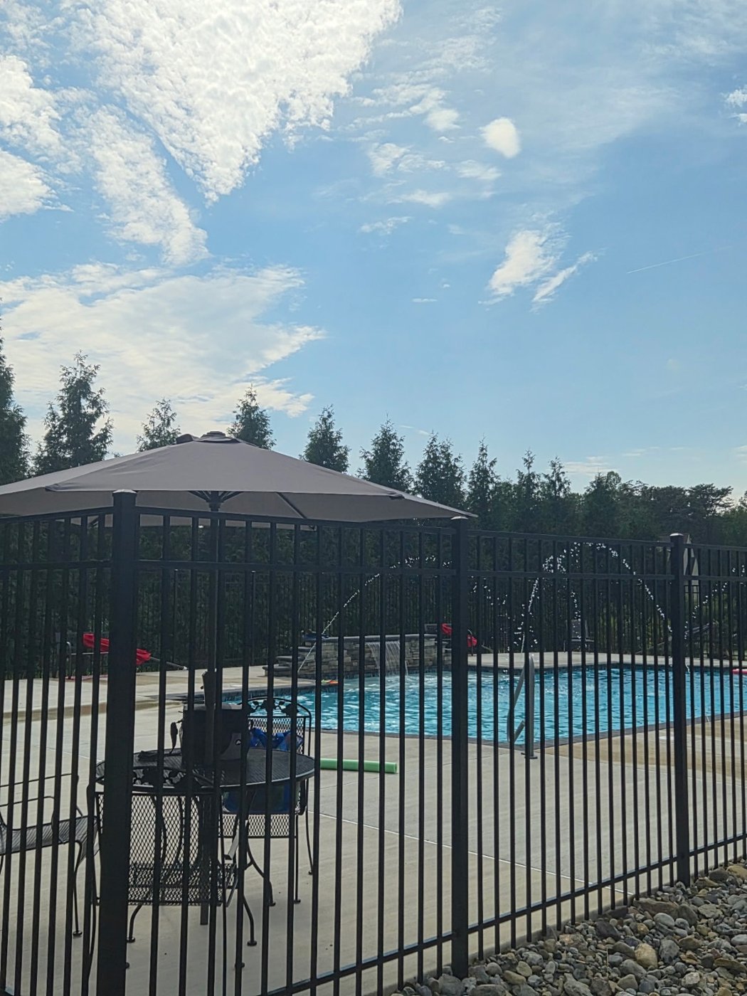 Pool with water jets and outdoor seating