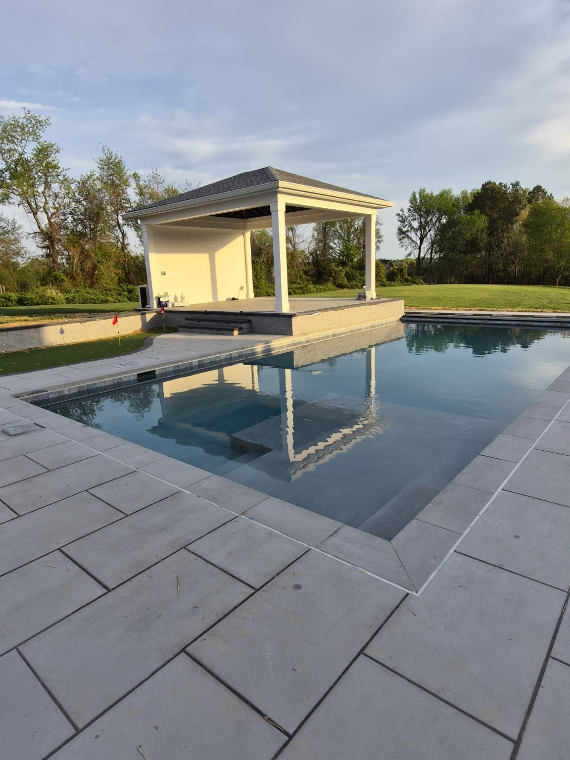 Contemporary pool and pavilion