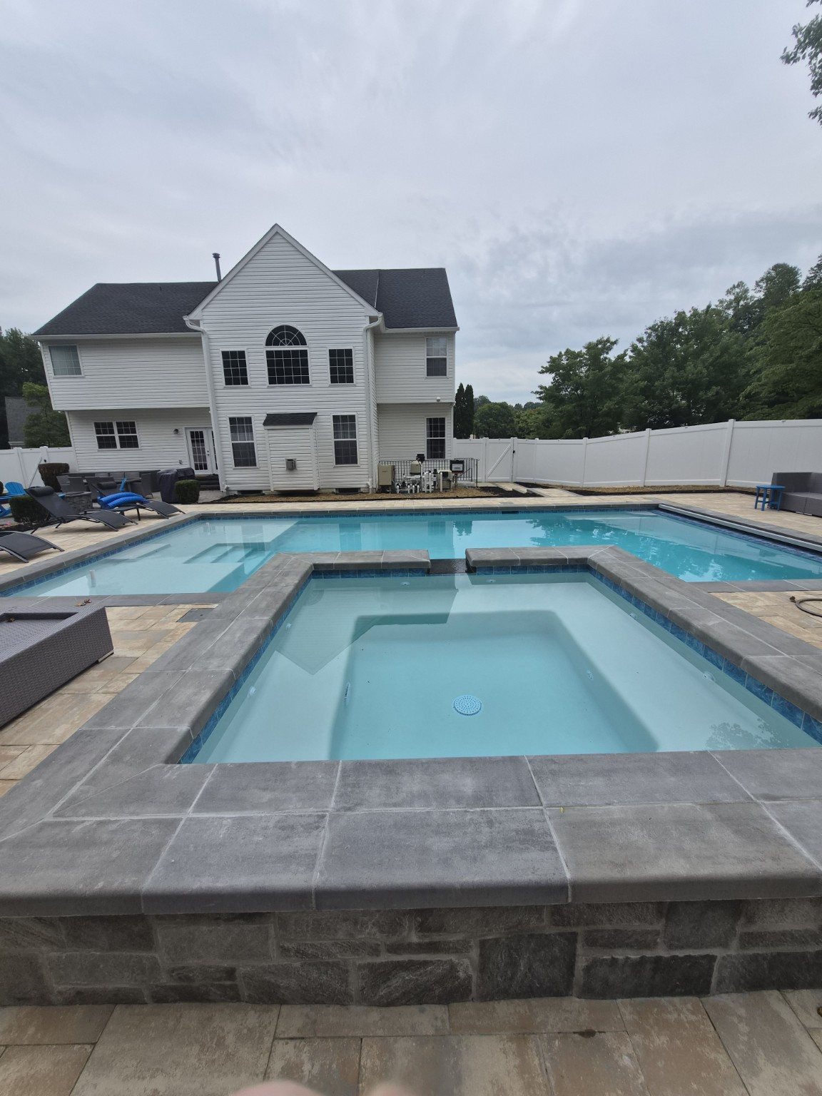 Freeform pool and raised spa