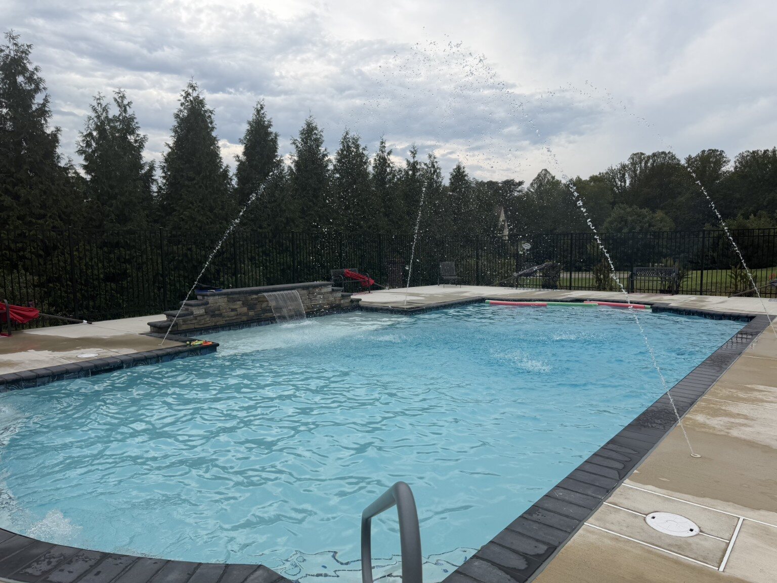 Pool with water features